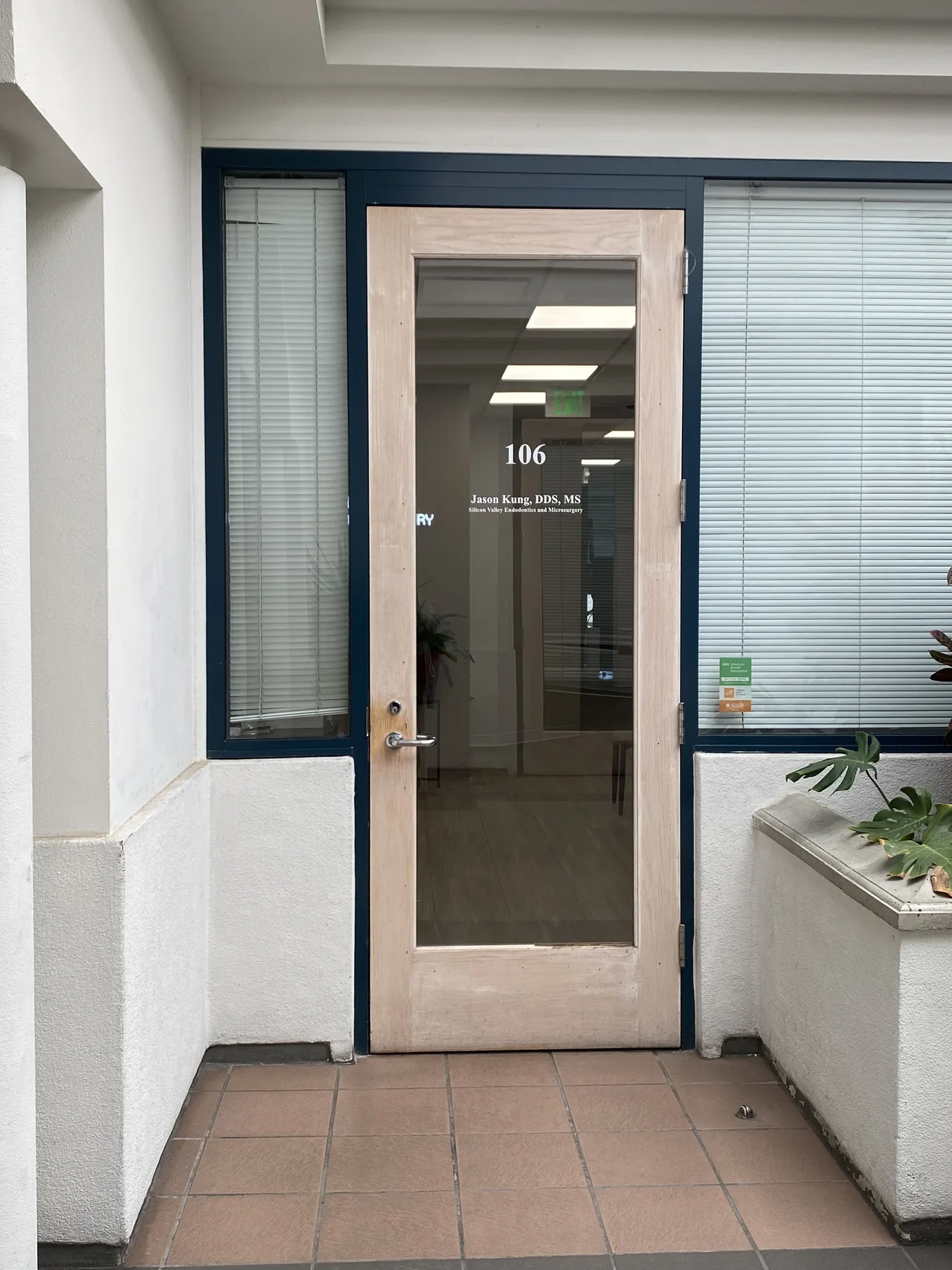 Glass entrance door for Suite 106 with Jason Kung DDS MS lettering — Silicon Valley Endodontics and Microsurgery